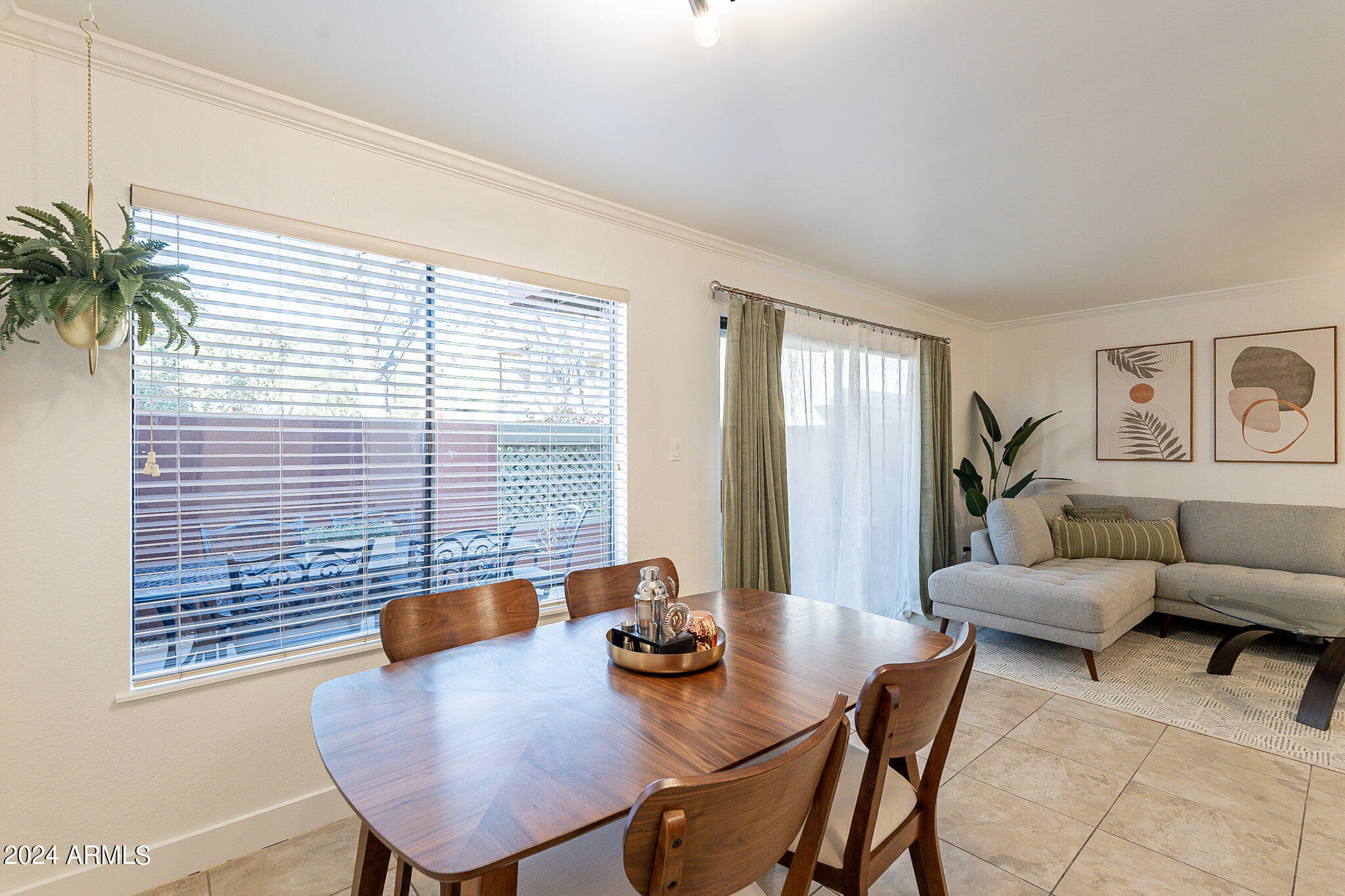 3500 North Hayden Road, Unit 1005 Scottsdale, AZ 85251 - Photo 14 of 51 a view of a dining room with furniture and window