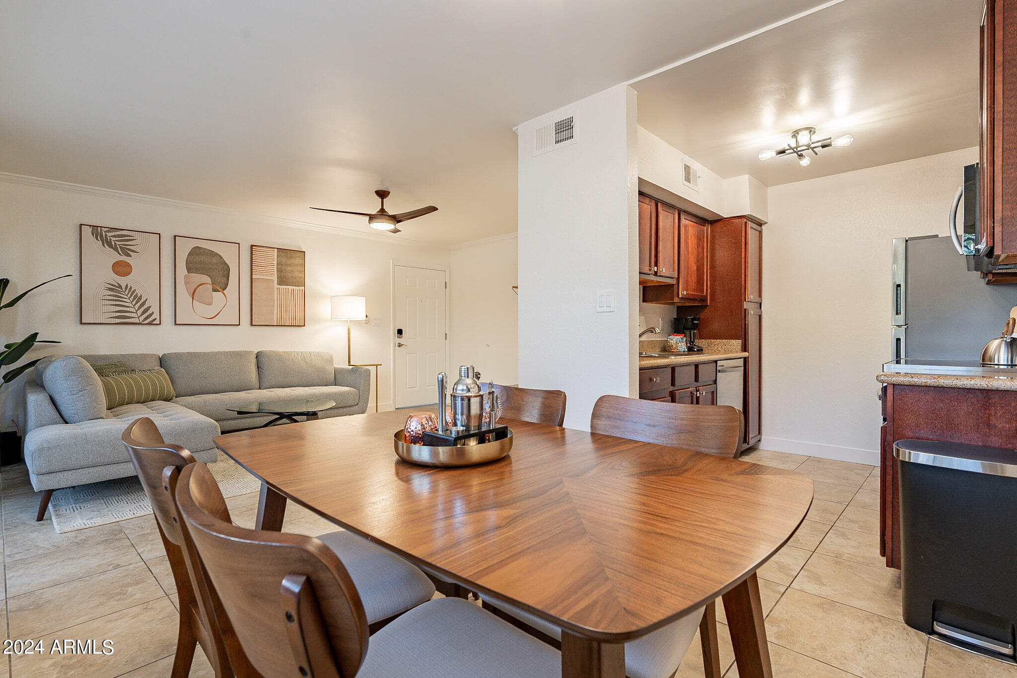 3500 North Hayden Road, Unit 1005 Scottsdale, AZ 85251 - Photo 15 of 51 a living room with furniture and a table