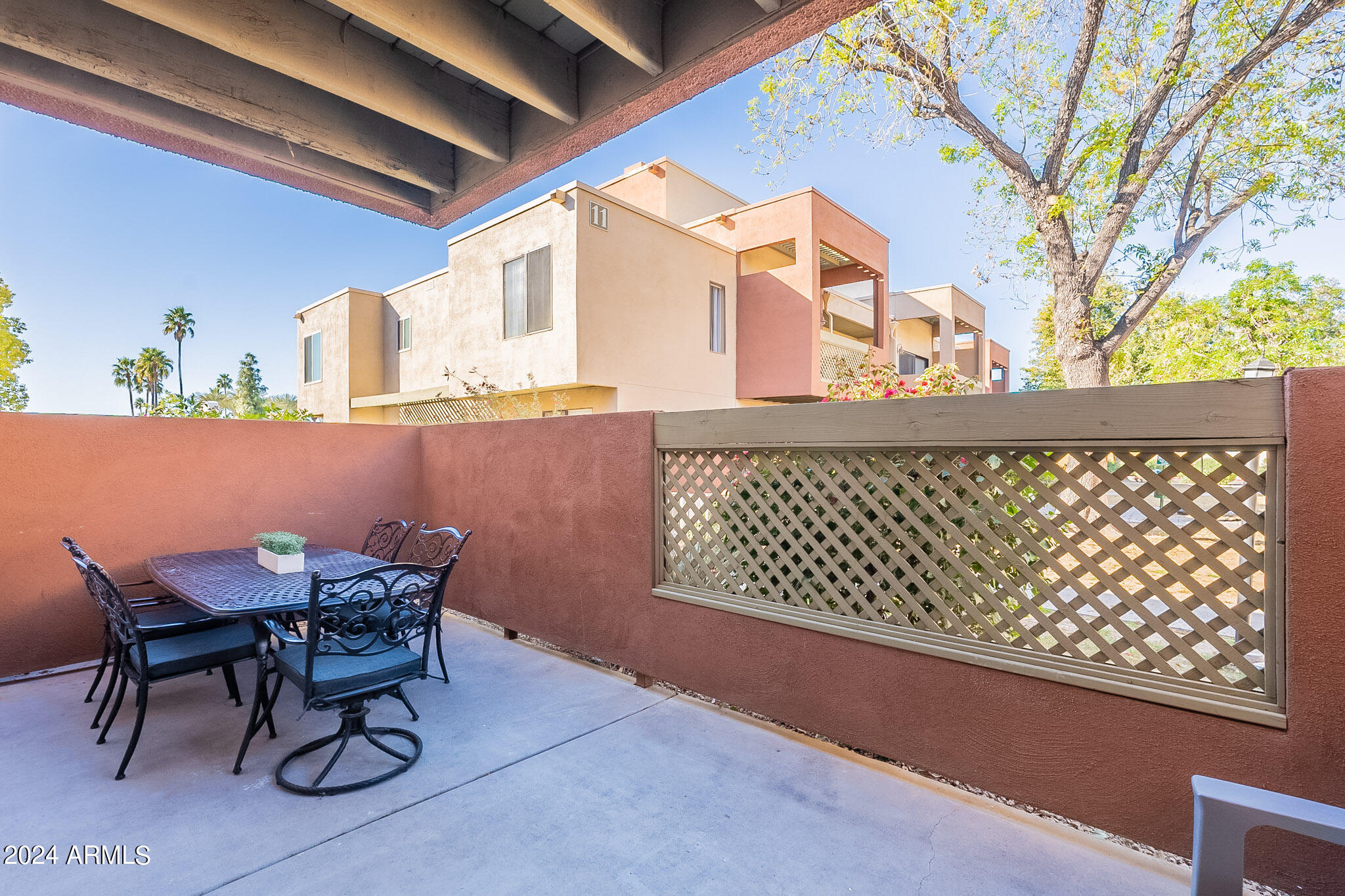 3500 North Hayden Road, Unit 1005 Scottsdale, AZ 85251 - Photo 29 of 51 a view of a chairs and table in patio