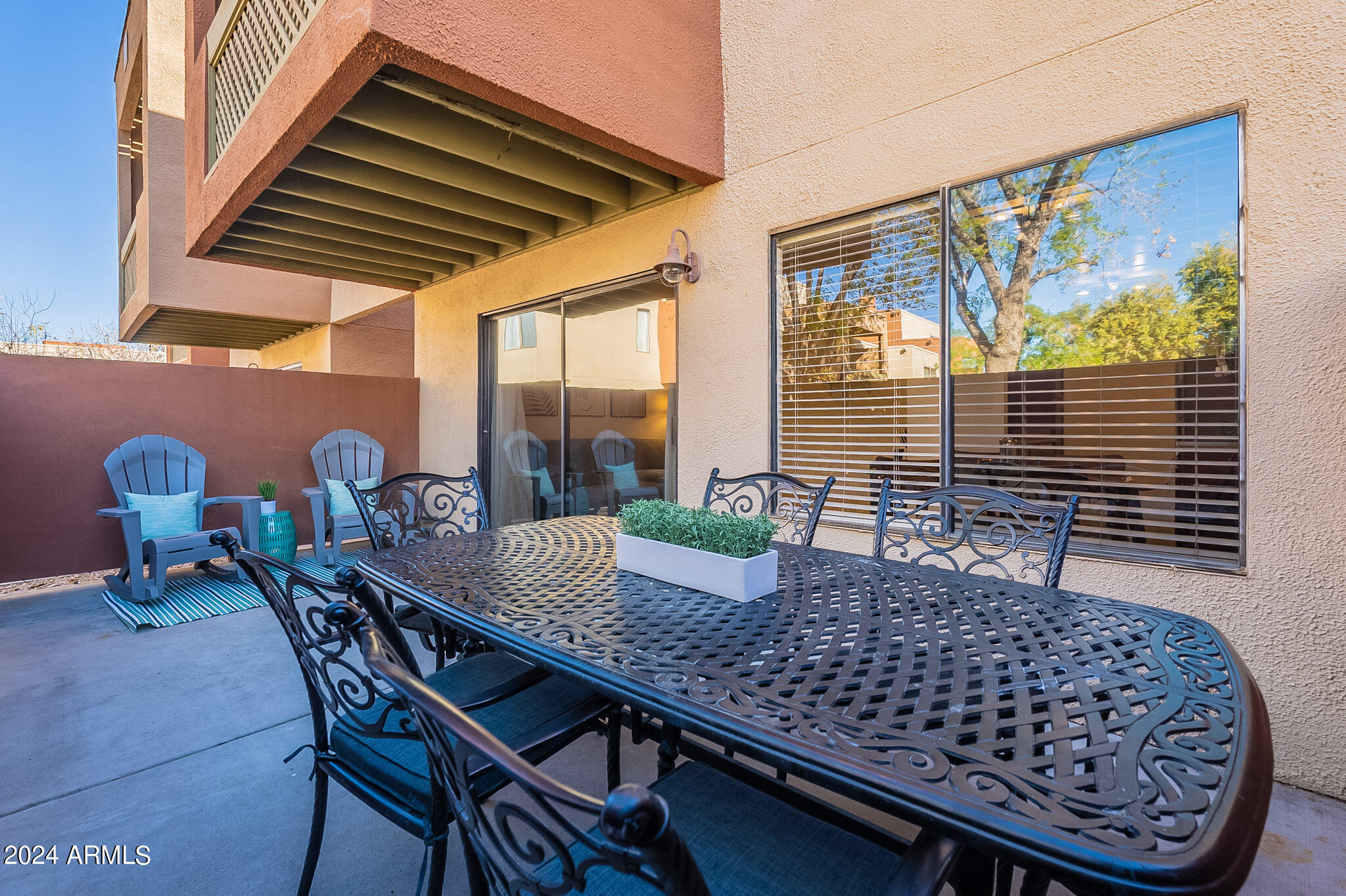 3500 North Hayden Road, Unit 1005 Scottsdale, AZ 85251 - Photo 31 of 51 a table and chairs with the wooden floor