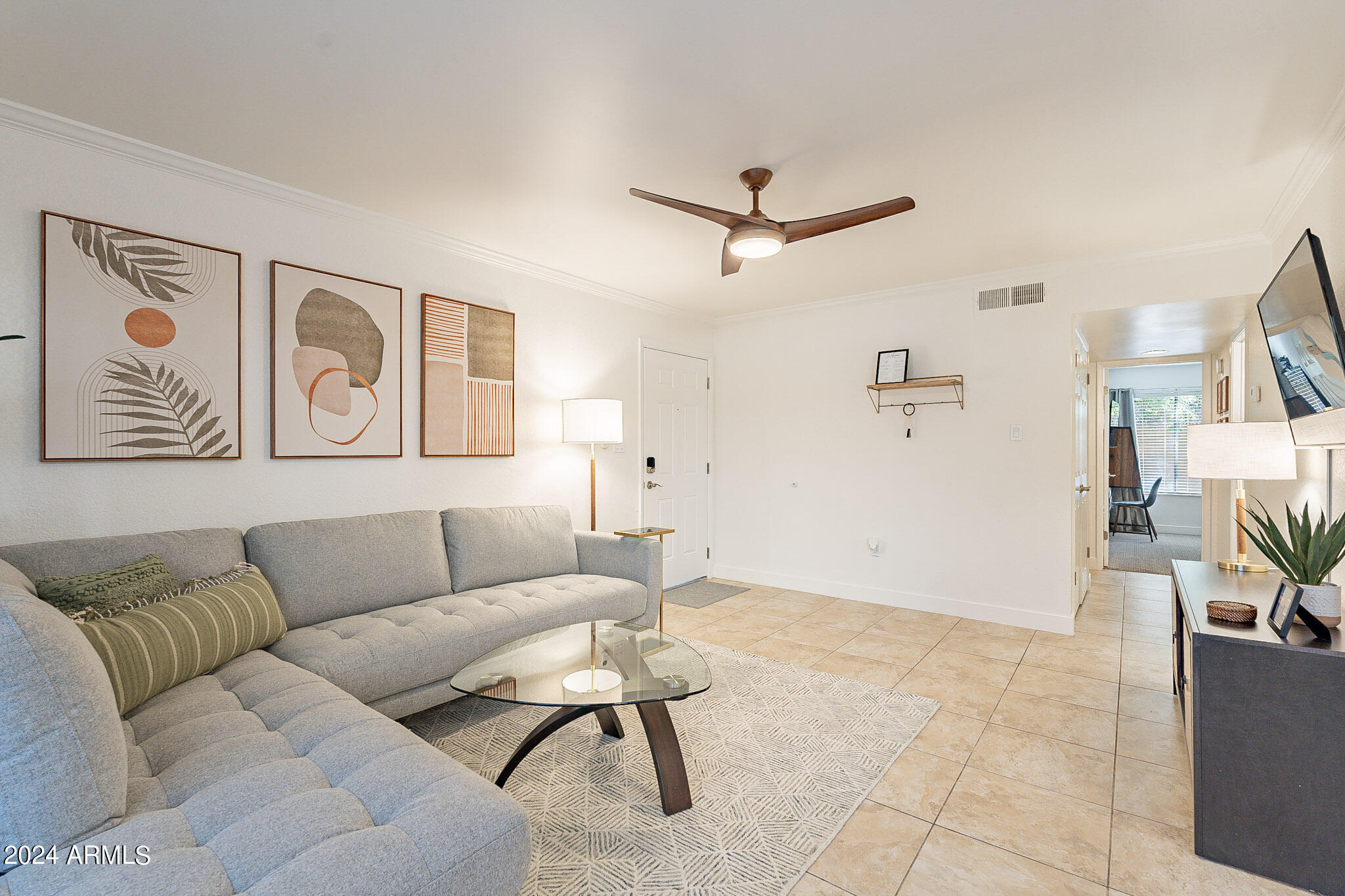 3500 North Hayden Road, Unit 1005 Scottsdale, AZ 85251 - Photo 5 of 51 a living room with furniture and a window