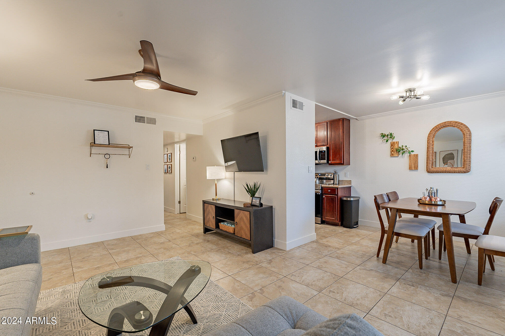3500 North Hayden Road, Unit 1005 Scottsdale, AZ 85251 - Photo 6 of 51 a living room with furniture and wooden floor