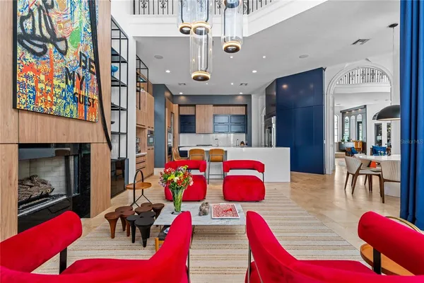 a view of swimming pool with outdoor seating and plants