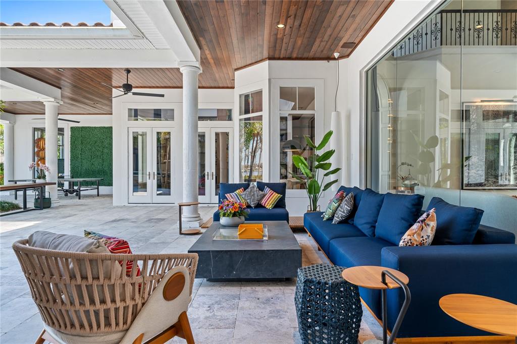 9343 Tibet Pointe Circle Windermere, FL 34786 - Photo 72 of 100 a living room with furniture a rug and a large window