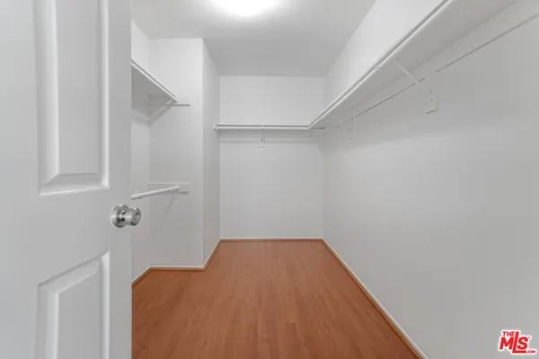 a view of a room with racks on the wall