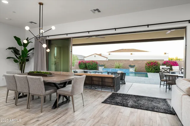 a view of a dining room with furniture window and outside view