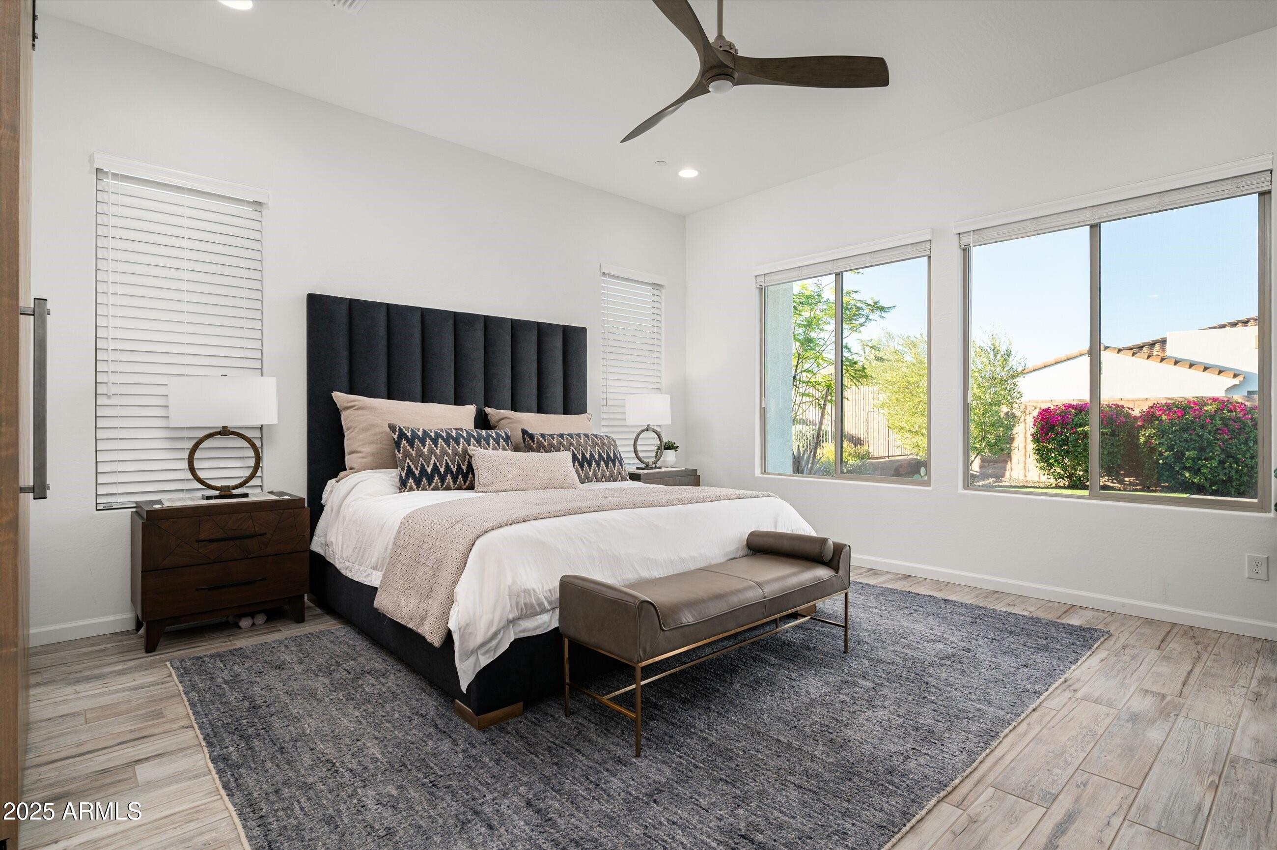 17864 East Veit Springs Drive Rio Verde, AZ 85263 - Photo 14 of 44 a bed sitting in a spacious bedroom next to a window