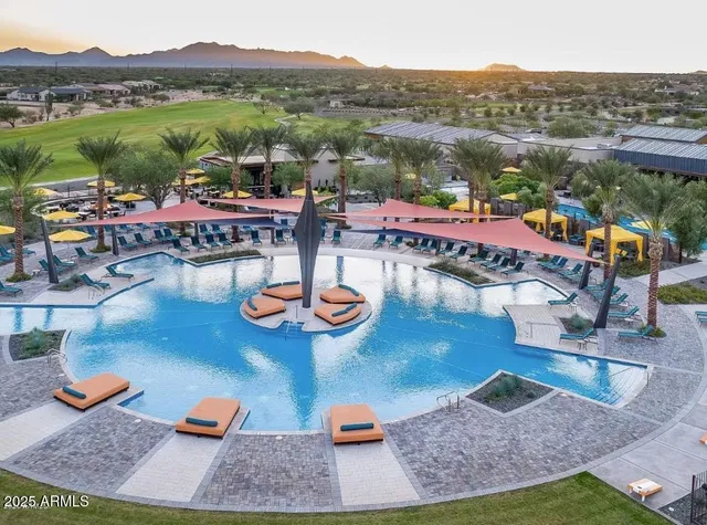 a view of a lake with couches