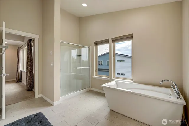 a living room with a couch and a shower