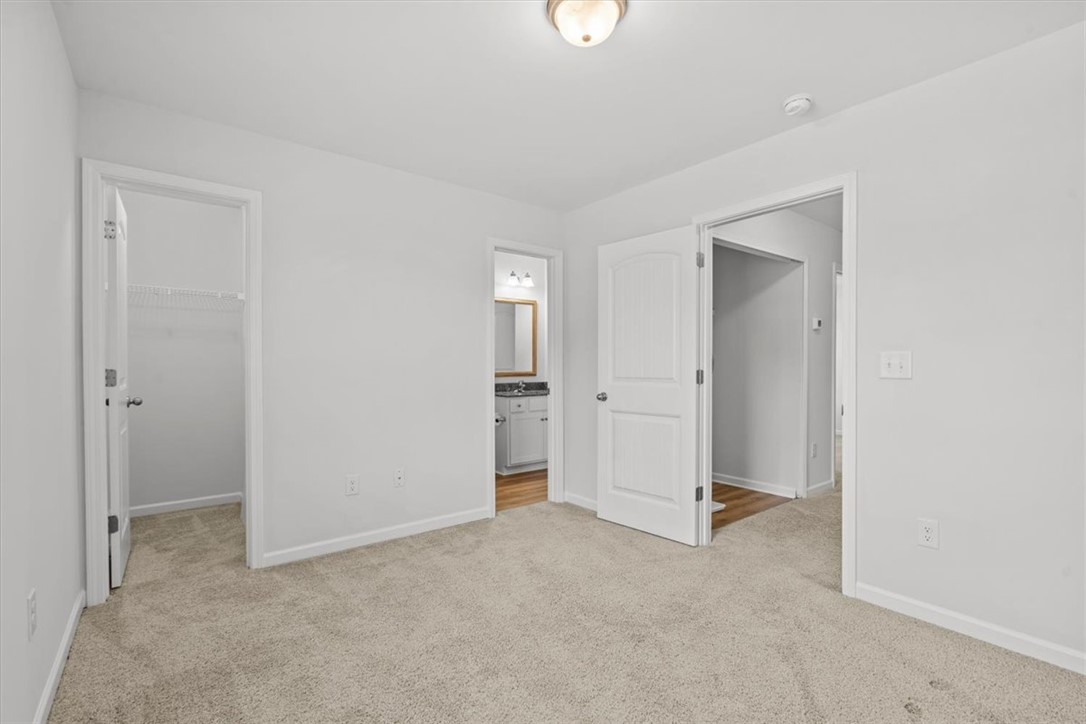 118 Adger Road Pendleton, SC 29670 - Photo 14 of 31 This versatile room features plush carpet and convenient access to a full bathroom and closet space.