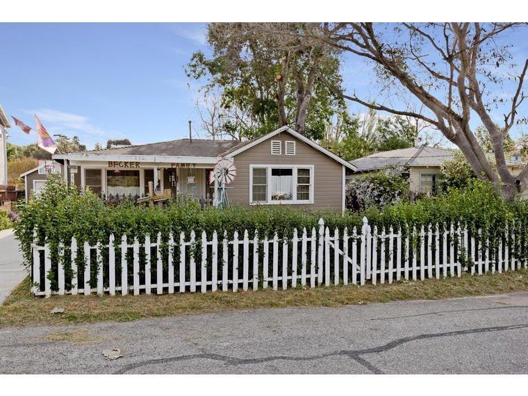 142 Valley Road Oak View, CA 93022 - Photo 1 of 10 a front view of a house with a garden