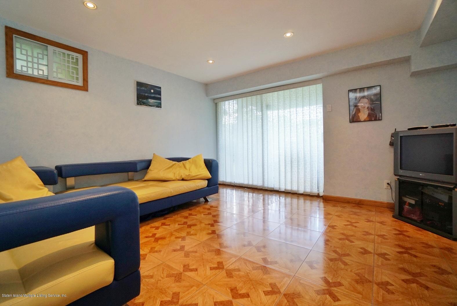 2223 Clove Road Staten Island, NY 10305 - Photo 33 of 46 (33) Level 1 Family Room or Bedroom 4