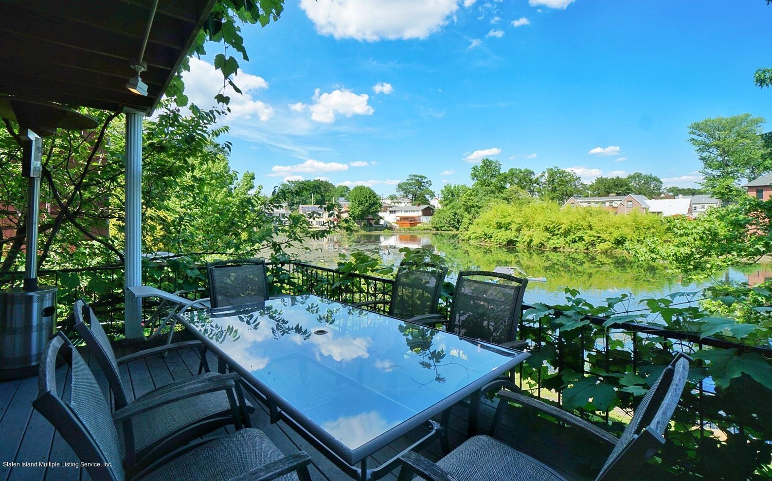 2223 Clove Road Staten Island, NY 10305 - Photo 43 of 46 (43) Living Room Terrace Deck Summer Tim