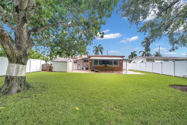 a view of a garden with a bench