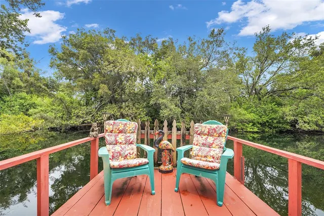 a view of swimming pool with a yard