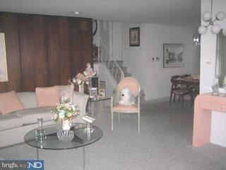 1205 Greenhill Road Flourtown, PA 19031 - Photo 4 of 6 a dining room with furniture and chandelier