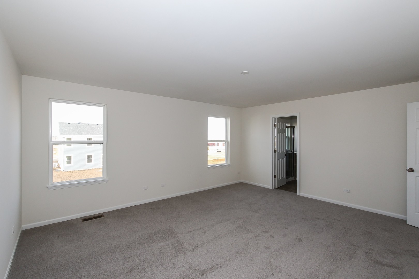 1309 Endicott Road South Elgin, IL 60177 - Photo 20 of 29 an empty room with windows