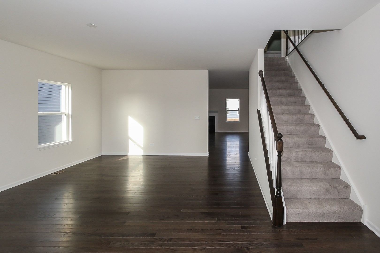 1309 Endicott Road South Elgin, IL 60177 - Photo 2 of 29 a view of entryway and hall with wooden floor