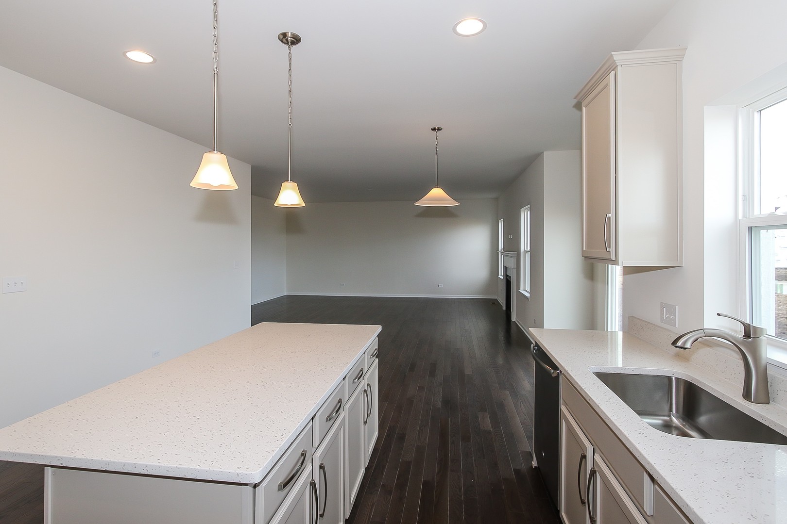 1309 Endicott Road South Elgin, IL 60177 - Photo 9 of 29 a kitchen with a sink and chandelier