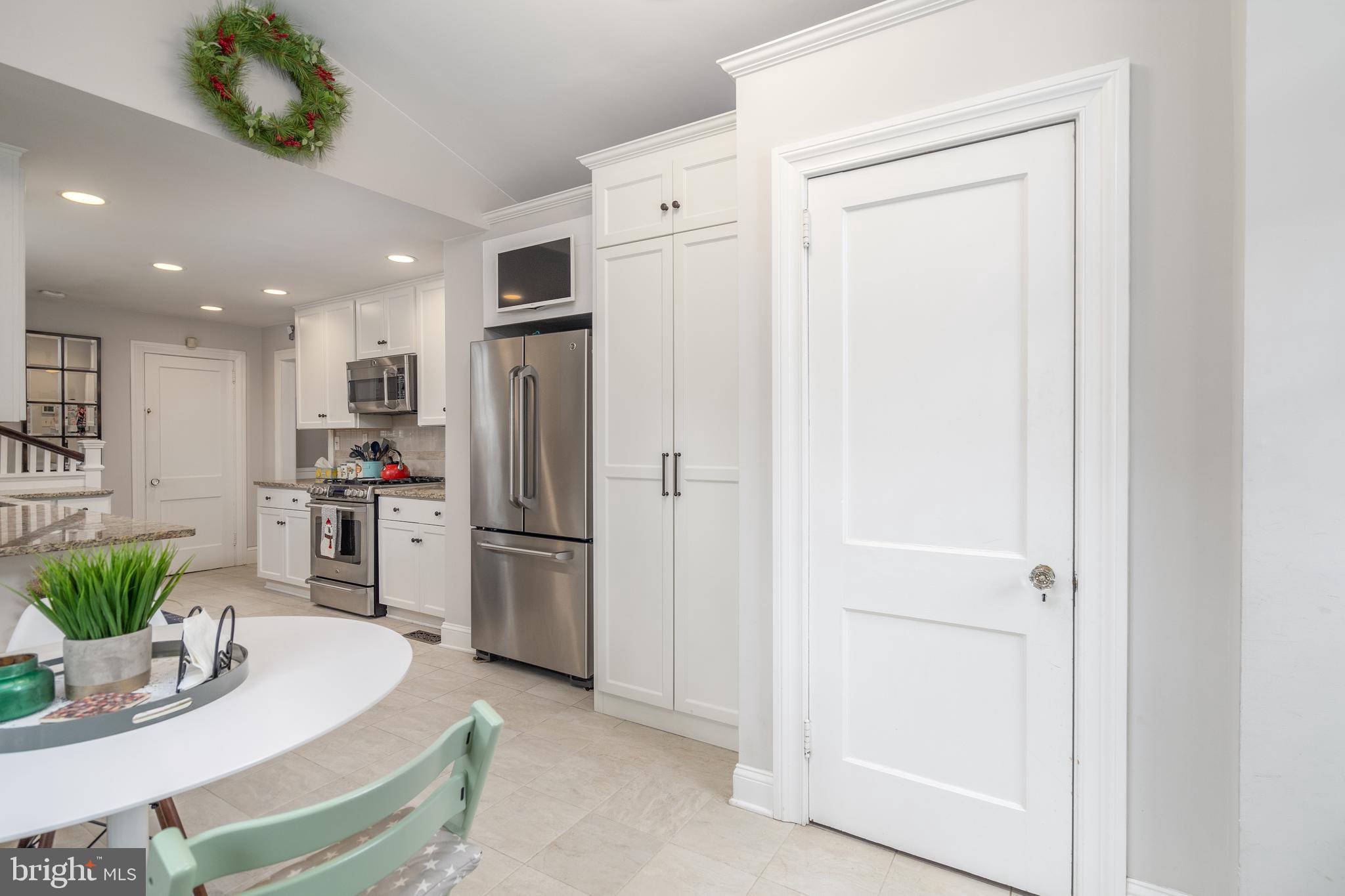 676 Glenmary Road Wayne, PA 19087 - Photo 13 of 38 a kitchen with stainless steel appliances a refrigerator and a refrigerator