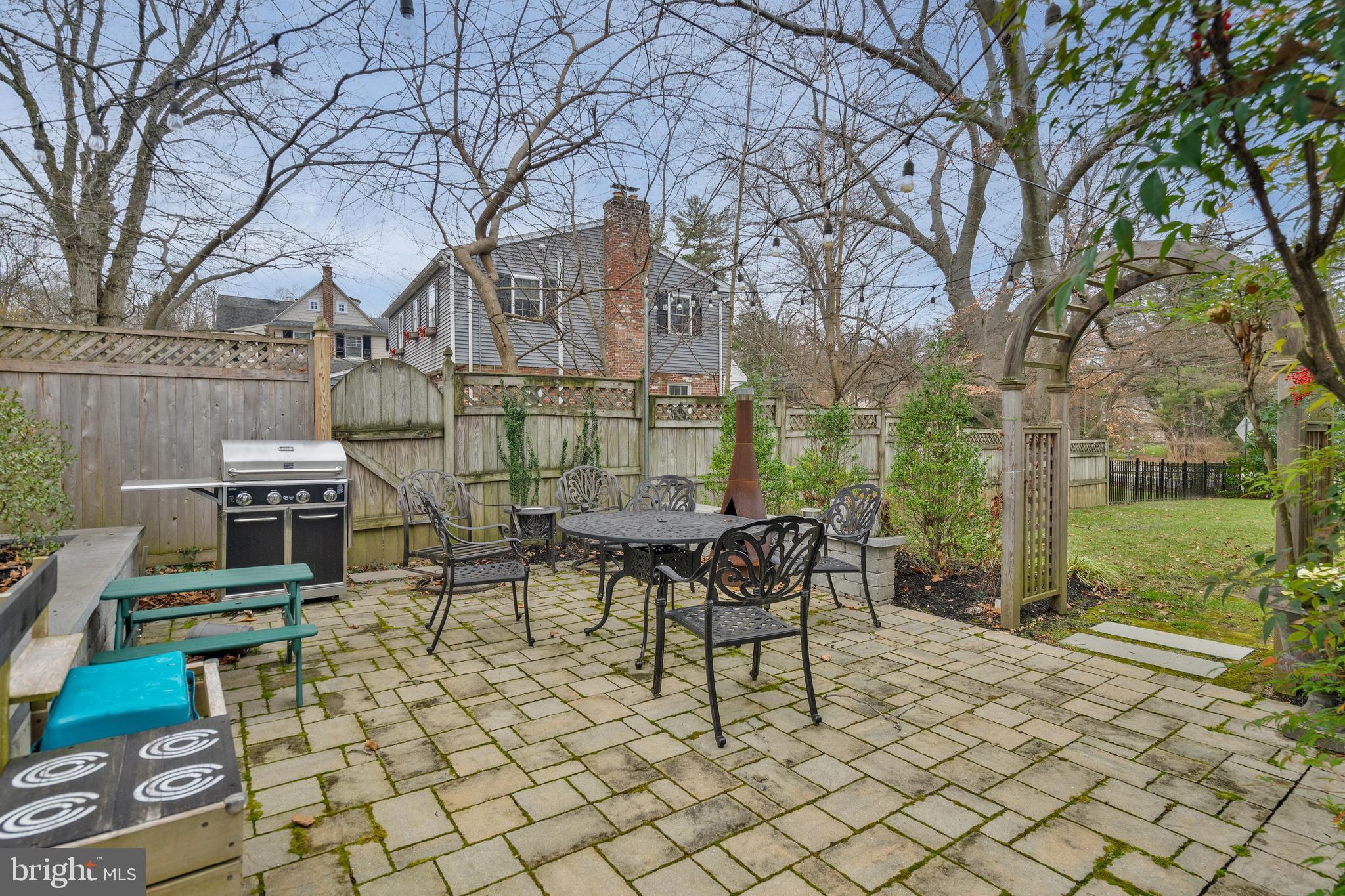 676 Glenmary Road Wayne, PA 19087 - Photo 17 of 38 a view of a patio with table and chairs and potted plants