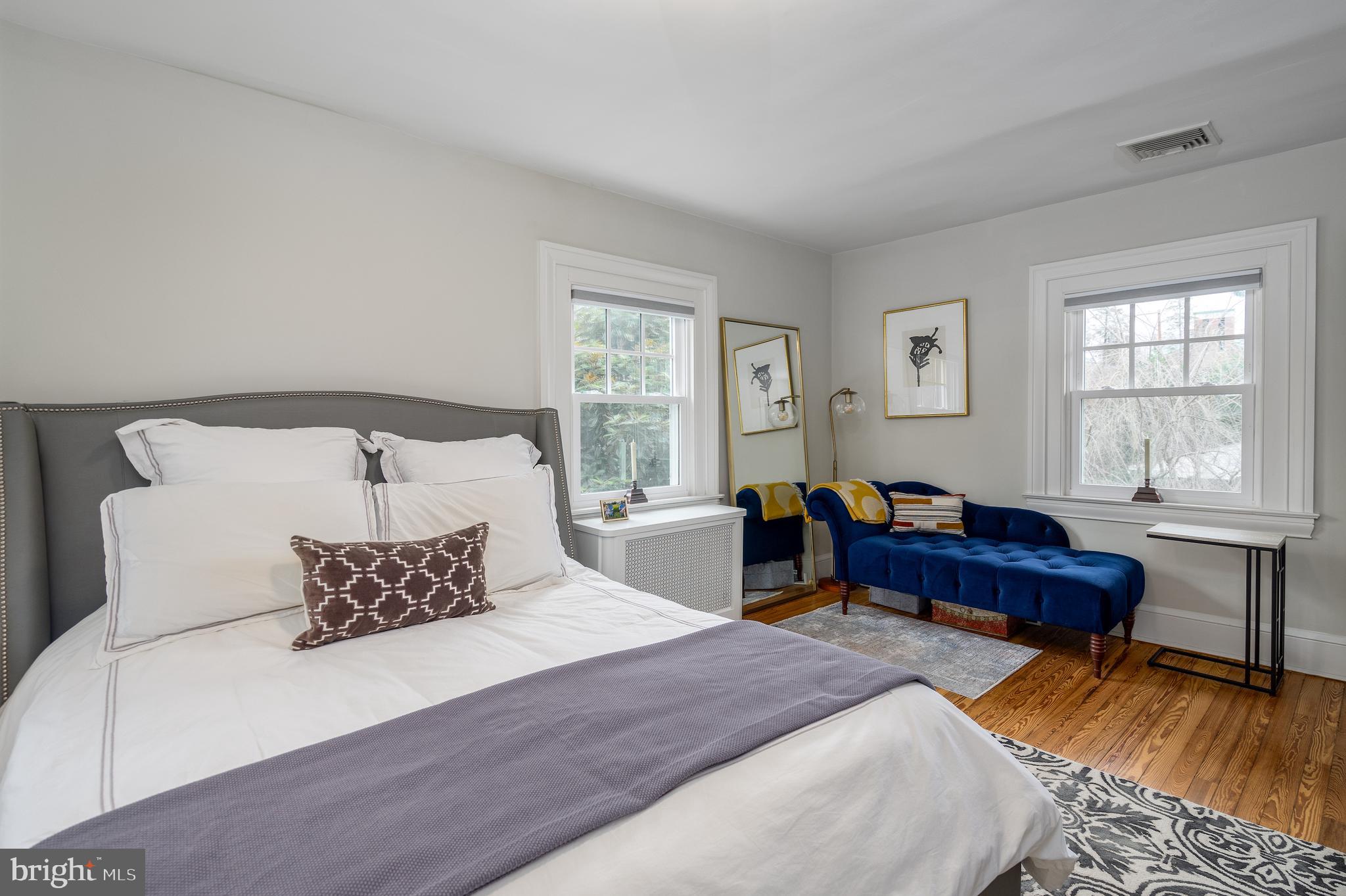 676 Glenmary Road Wayne, PA 19087 - Photo 22 of 38 a bedroom with a bed and a window