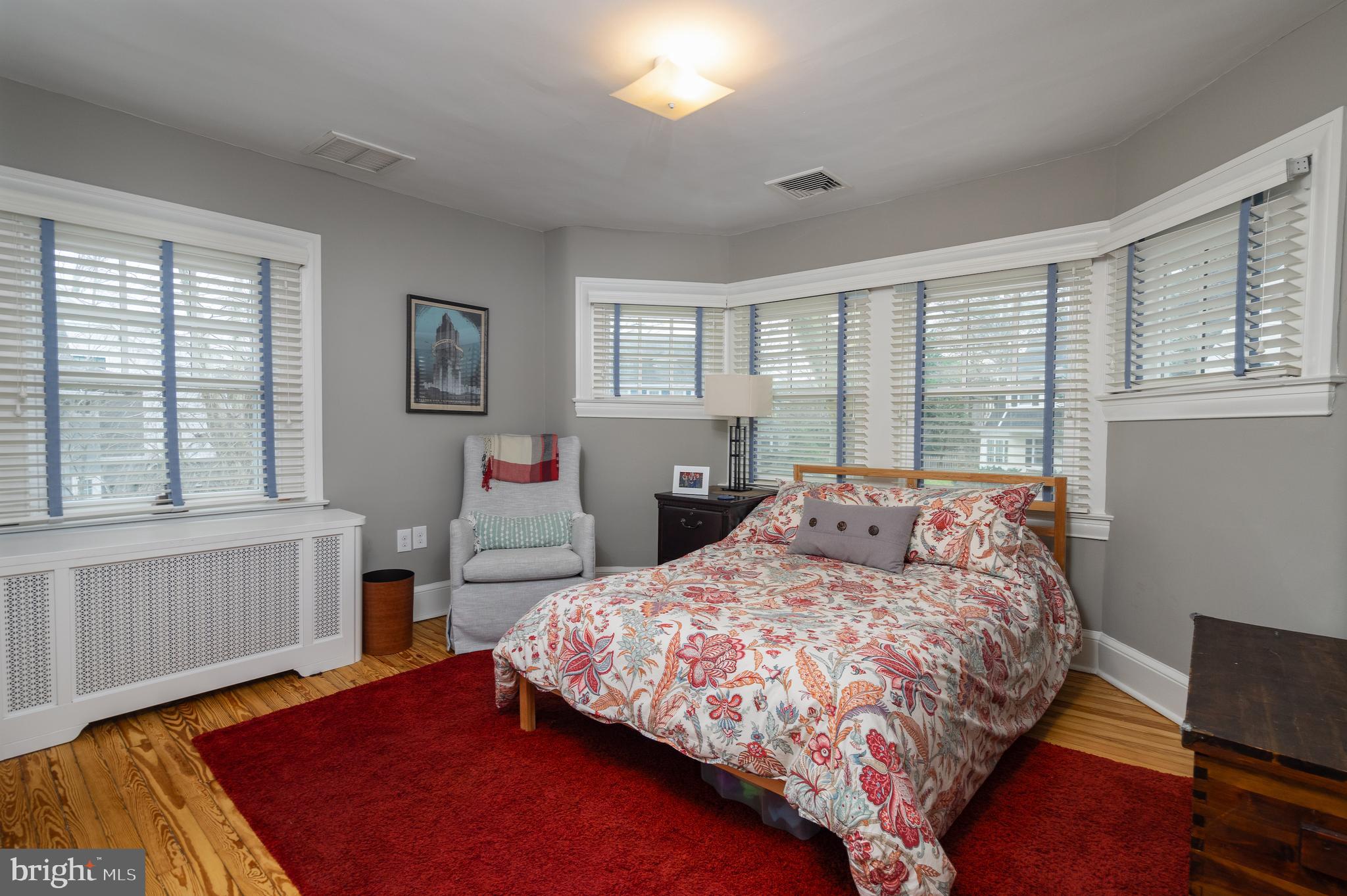 676 Glenmary Road Wayne, PA 19087 - Photo 29 of 38 a bedroom with a large bed and a window