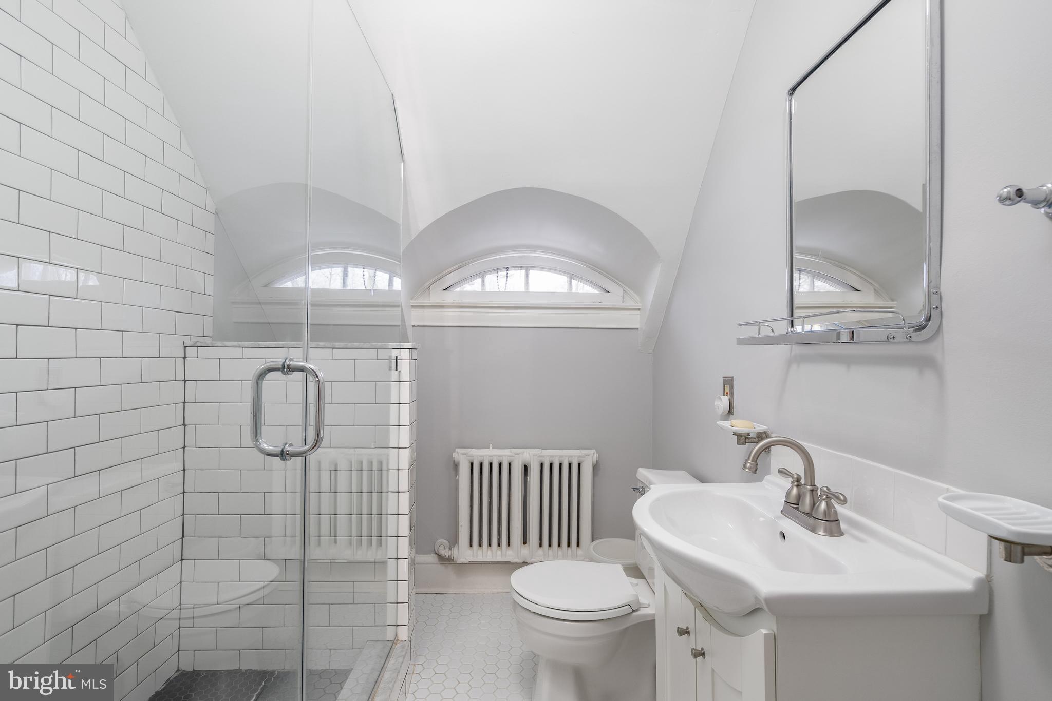 676 Glenmary Road Wayne, PA 19087 - Photo 32 of 38 a bathroom with a sink a toilet and shower