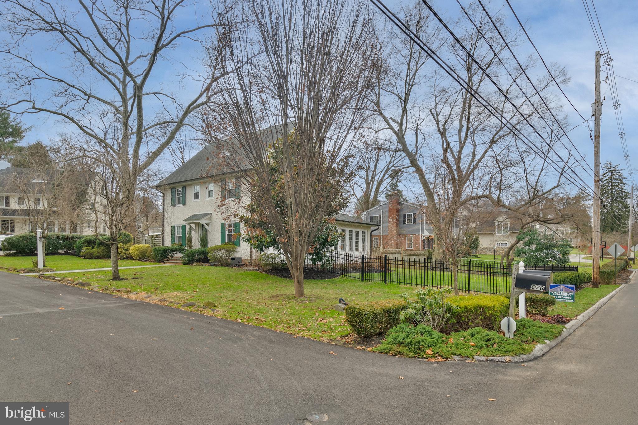 676 Glenmary Road Wayne, PA 19087 - Photo 35 of 38 a view of a house with a big yard and large trees