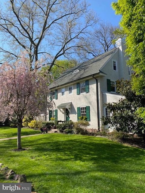 676 Glenmary Road Wayne, PA 19087 - Photo 38 of 38 a front view of a house with a garden