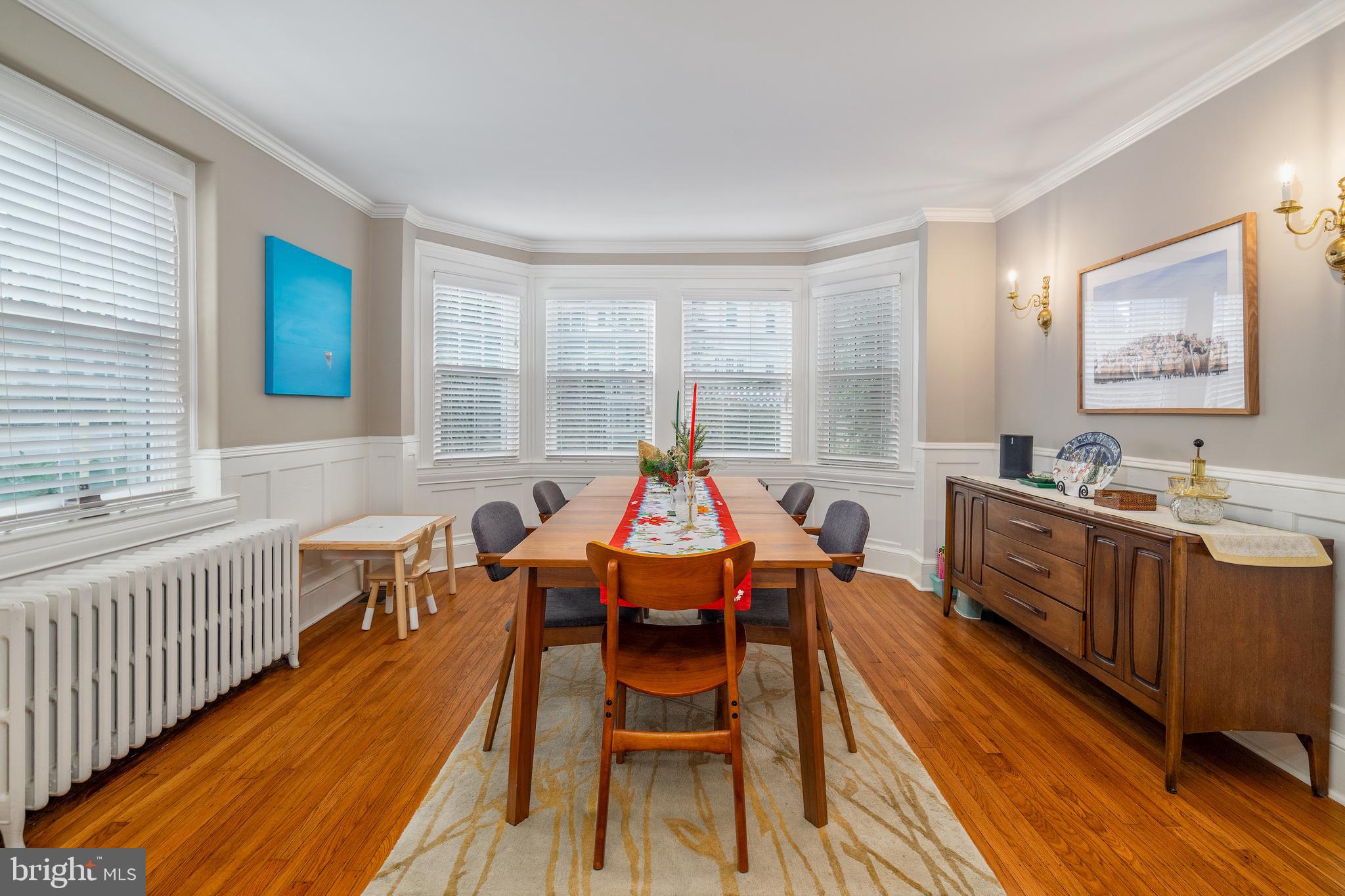 676 Glenmary Road Wayne, PA 19087 - Photo 8 of 38 a dining room with wooden floor and windows
