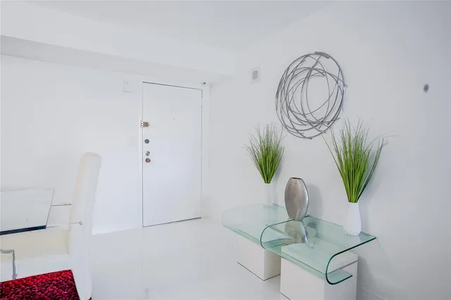 a vase of flowers sitting on a table