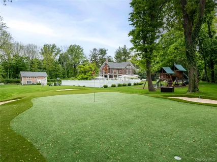 a view of a house with a big yard