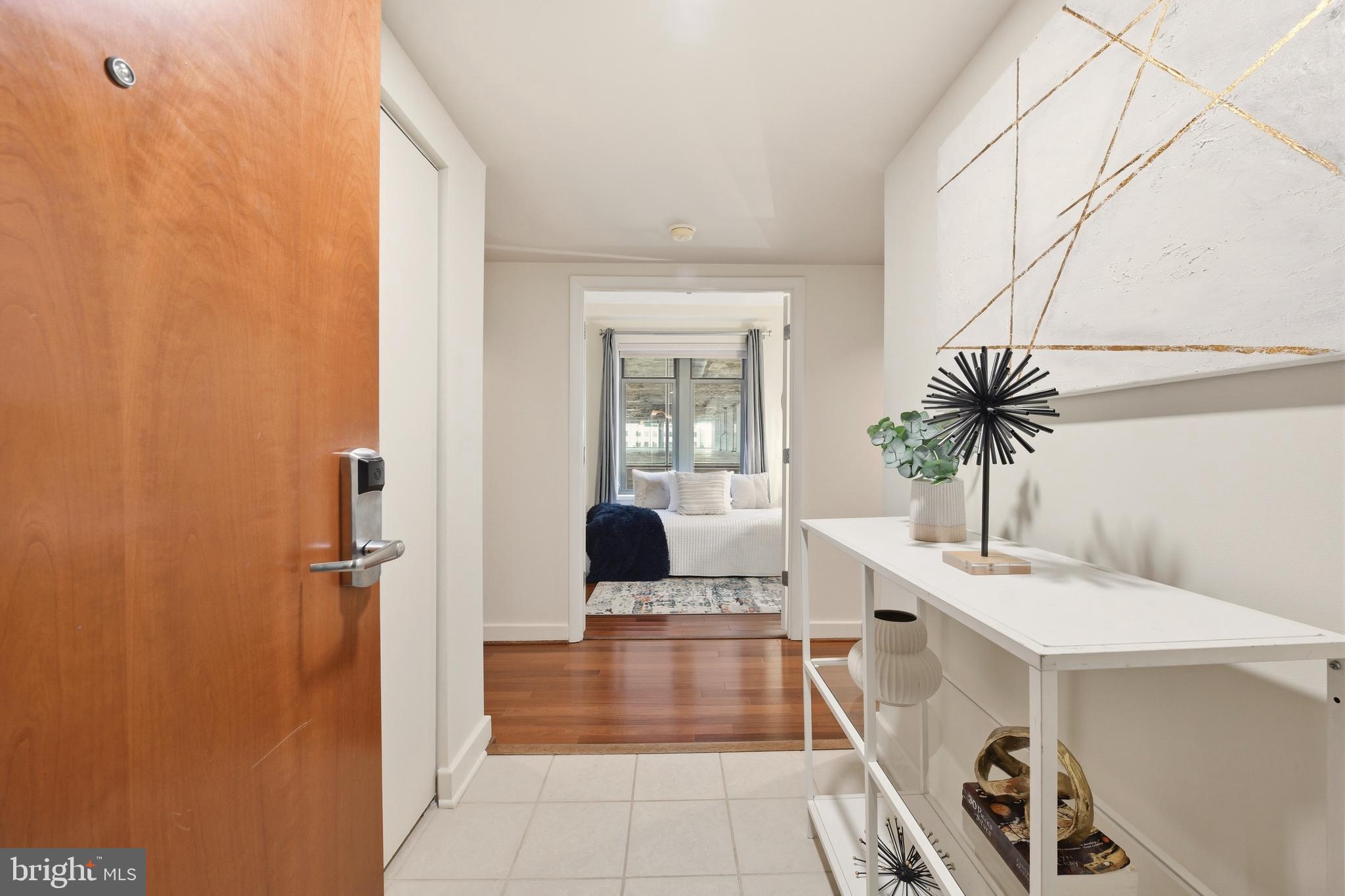 1150 K Street Northwest, Unit 1109 Washington, DC 20005 - Photo 14 of 33 a bathroom with a sink and a mirror
