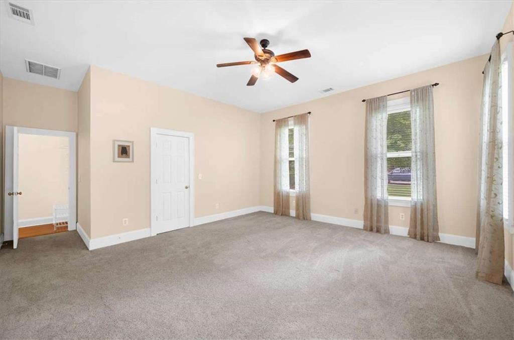 106 Westmore Road Southwest Rome, GA 30165 - Photo 38 of 56 a view of a livingroom with a ceiling fan and window