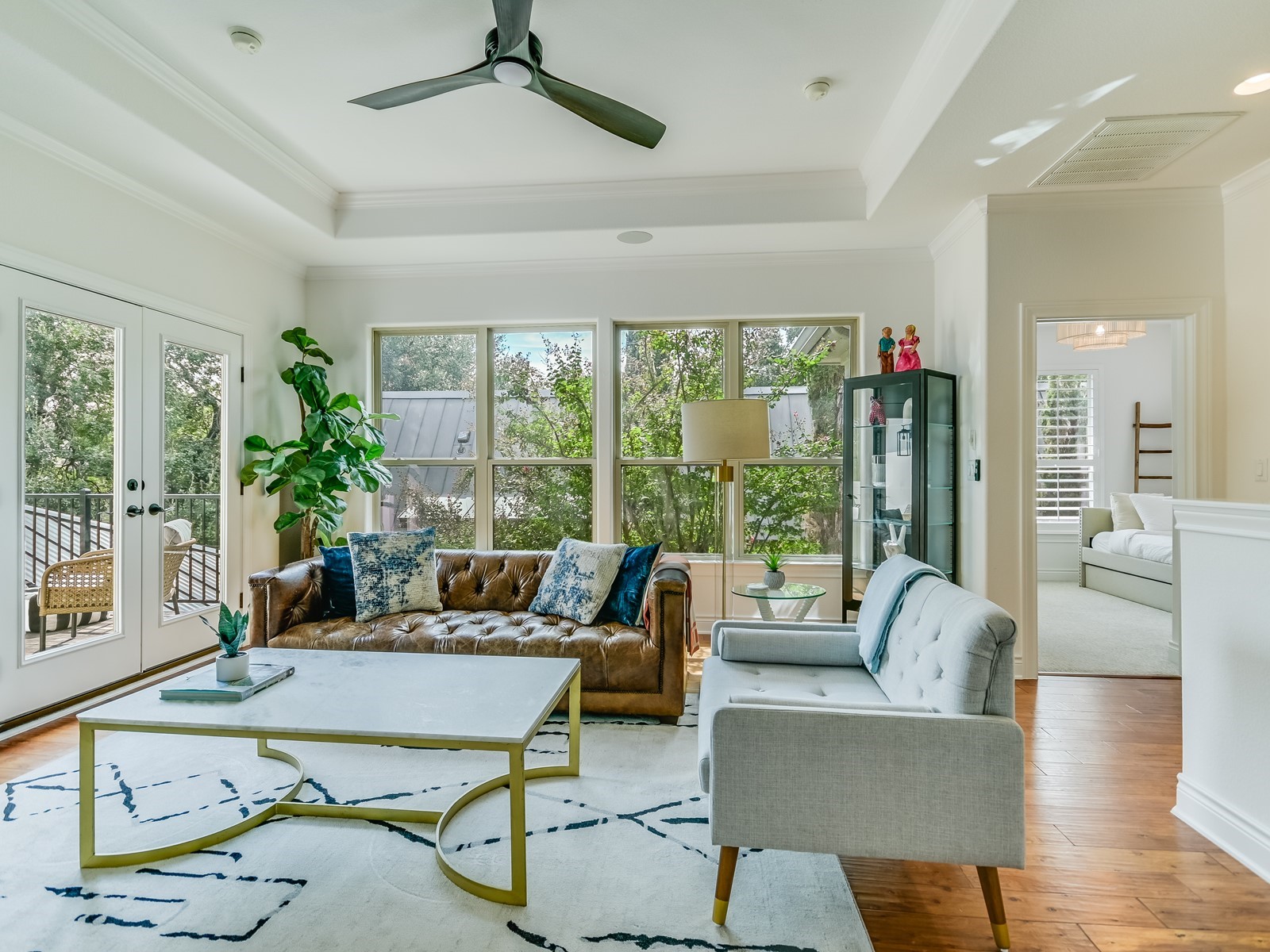 809 Kinney Avenue Austin, TX 78704 - Photo 11 of 21 a living room with furniture and a large window