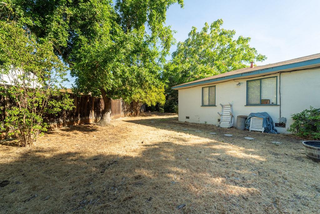 972 Michael Drive Campbell, CA 95008 - Photo 4 of 19 a view of a house with backyard and tree