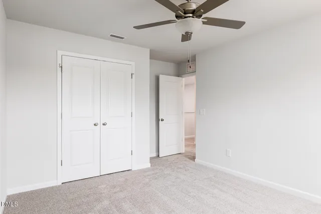 a bathroom with a sink vanity and a mirror
