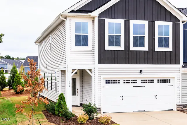 a view of a balcony with plants