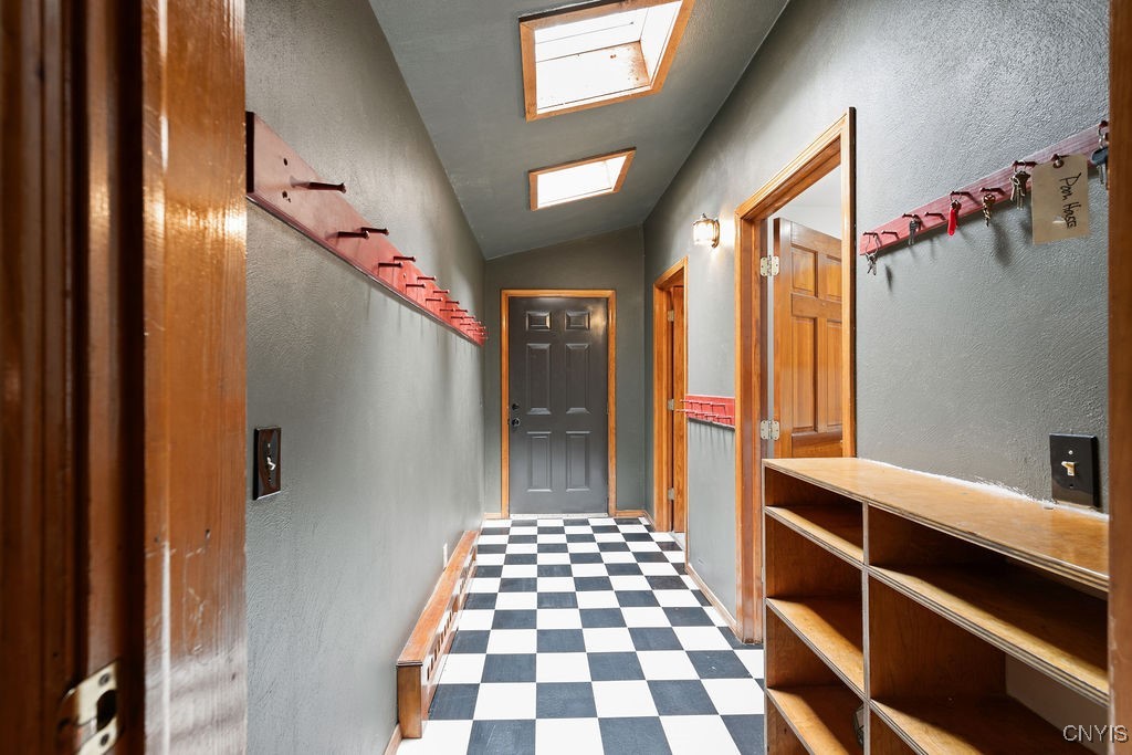 1826 Cardner Road Fabius, NY 13122 - Photo 17 of 50 View from living room to garage at end, laundry ro