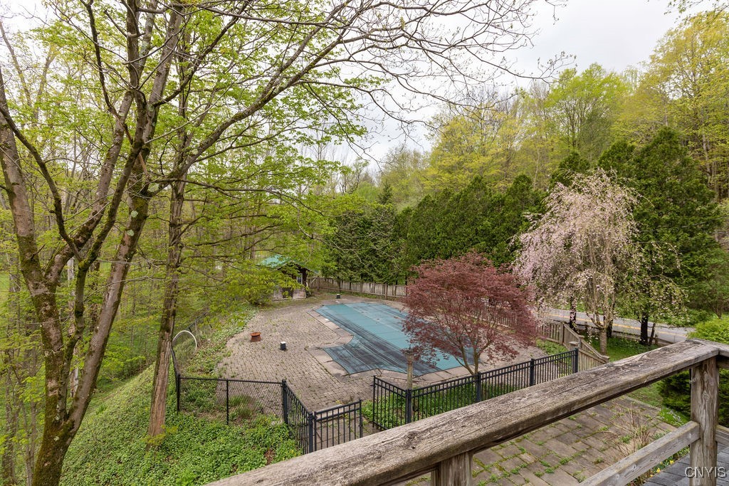 1826 Cardner Road Fabius, NY 13122 - Photo 38 of 50 In-ground pool and pool house from south end deck