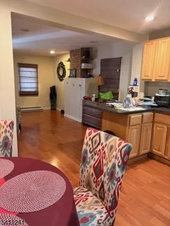 a kitchen with stainless steel appliances granite countertop a sink and cabinets