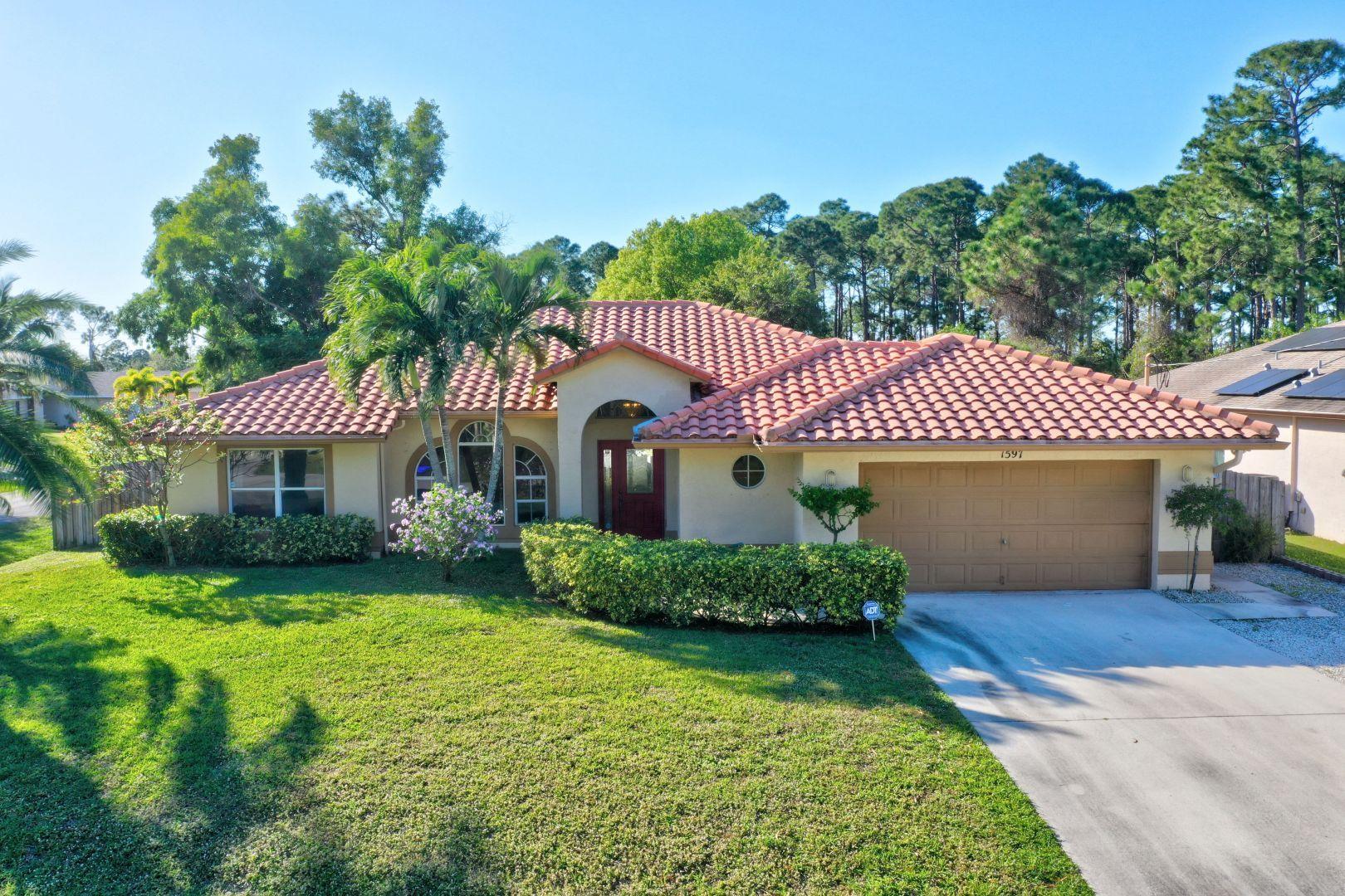 1597 Southwest Flagami Road Port St. Lucie, FL 34953 - Photo 1 of 51 47_dji_1055_6_7_8_9