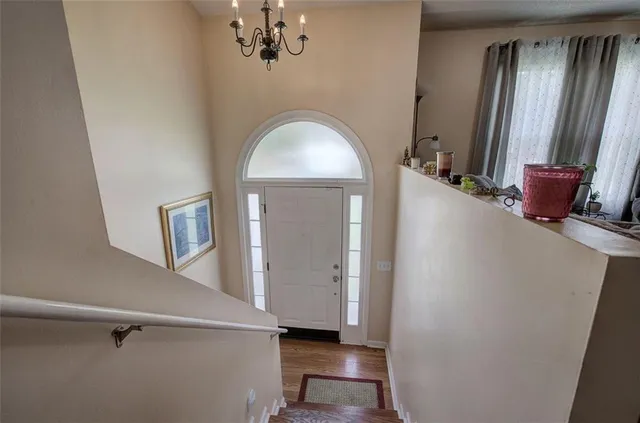 a view of a hallway with windows