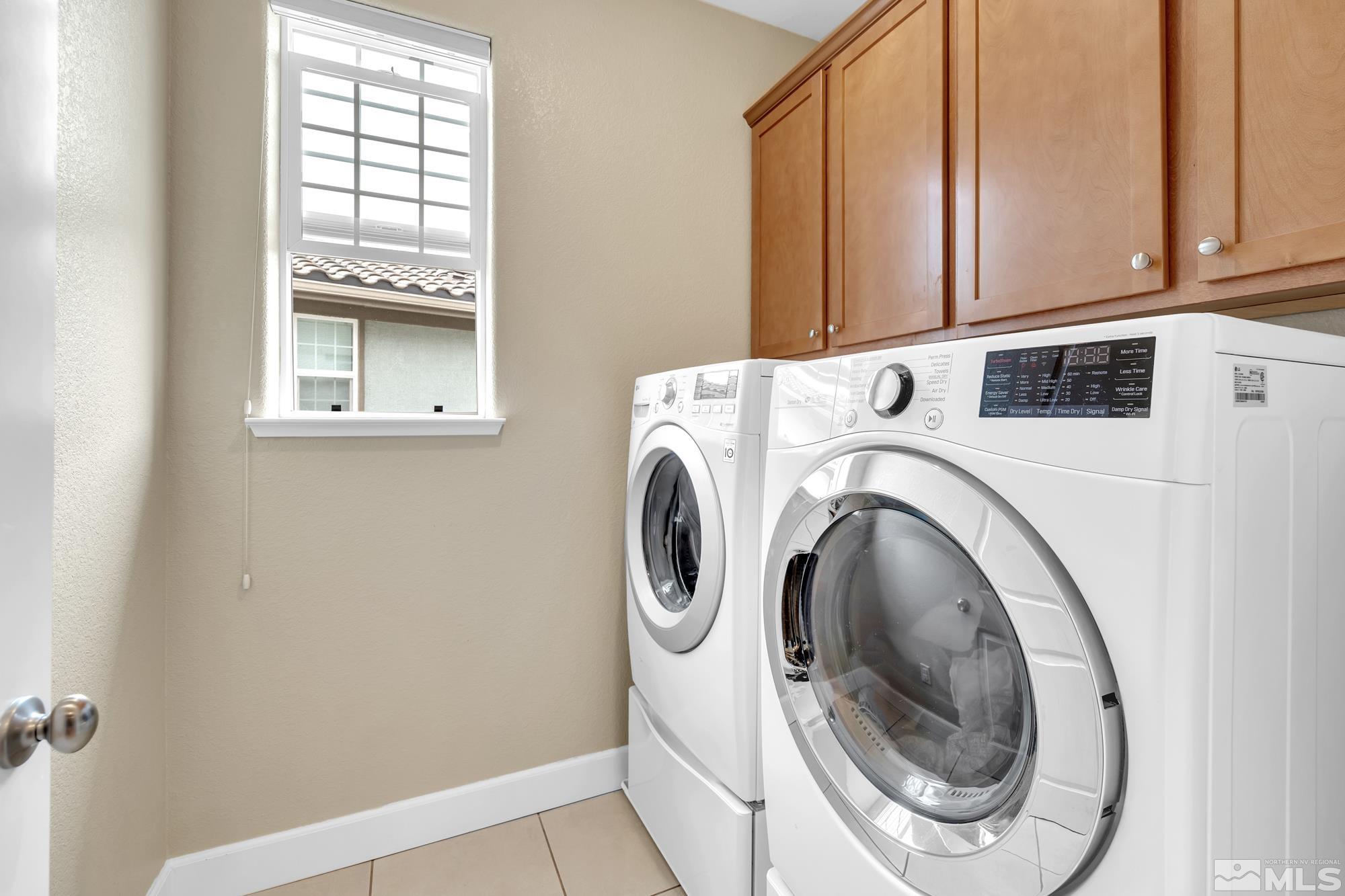 1880 Dark Horse Road, Unit A Reno, NV 89521 - Photo 15 of 20 a utility room with dryer and washer