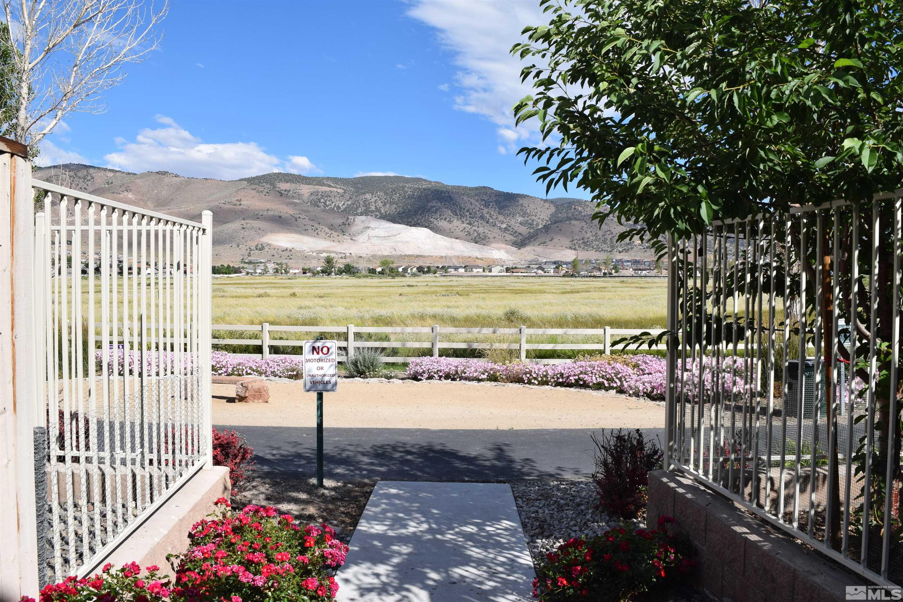 1880 Dark Horse Road, Unit A Reno, NV 89521 - Photo 3 of 20 a view of a balcony with an ocean view