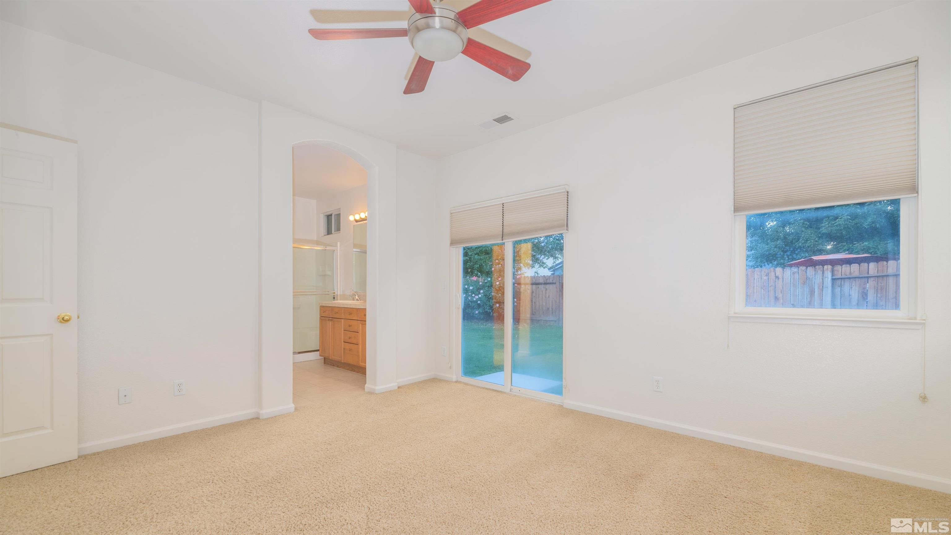1870 Jamboree Drive Reno, NV 89521 - Photo 13 of 27 a view of an empty room with a fan