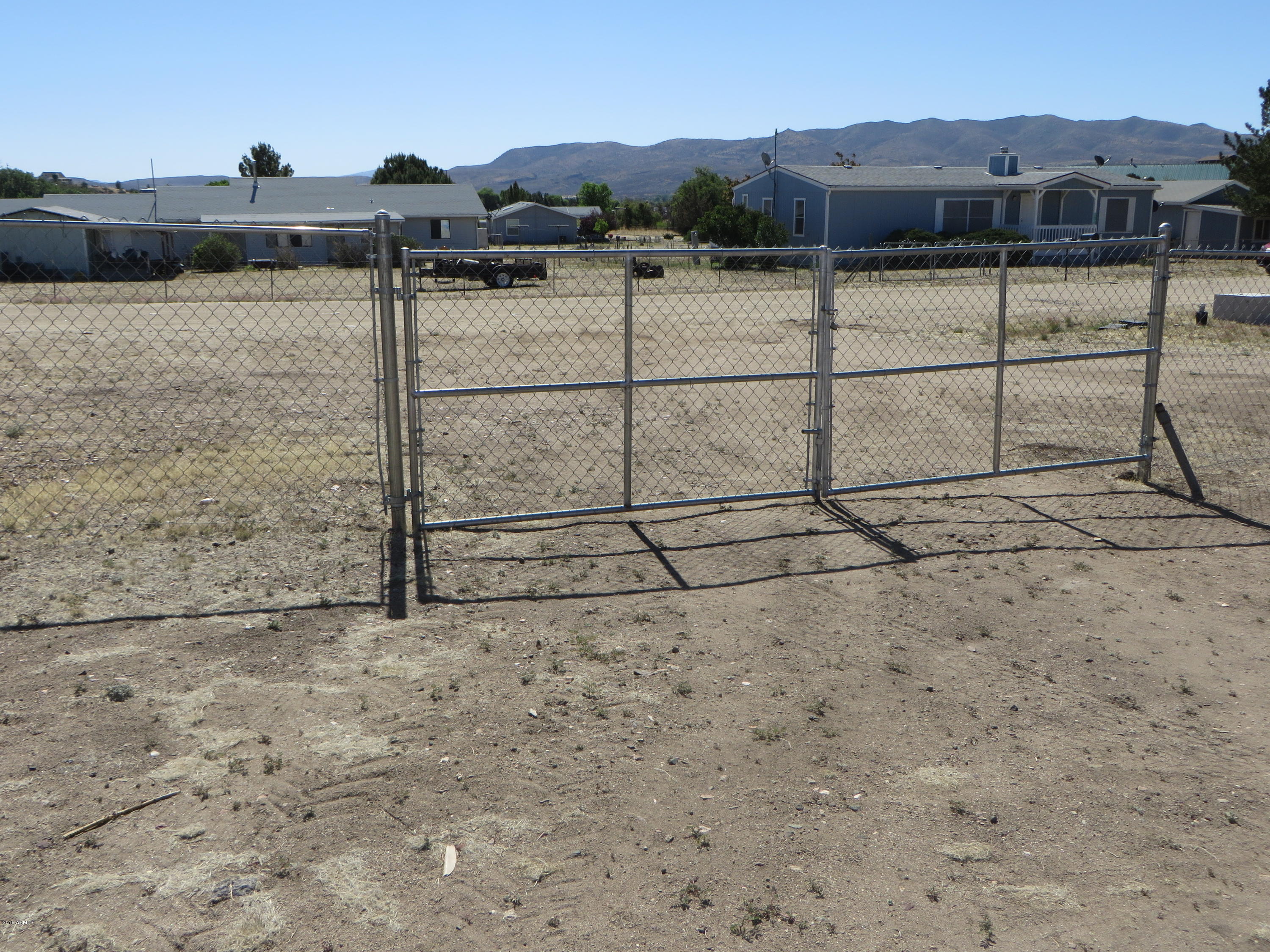 18482 Frontier Road Peeples Valley, AZ 86332 - Photo 50 of 67 RV gate to street from additional lot