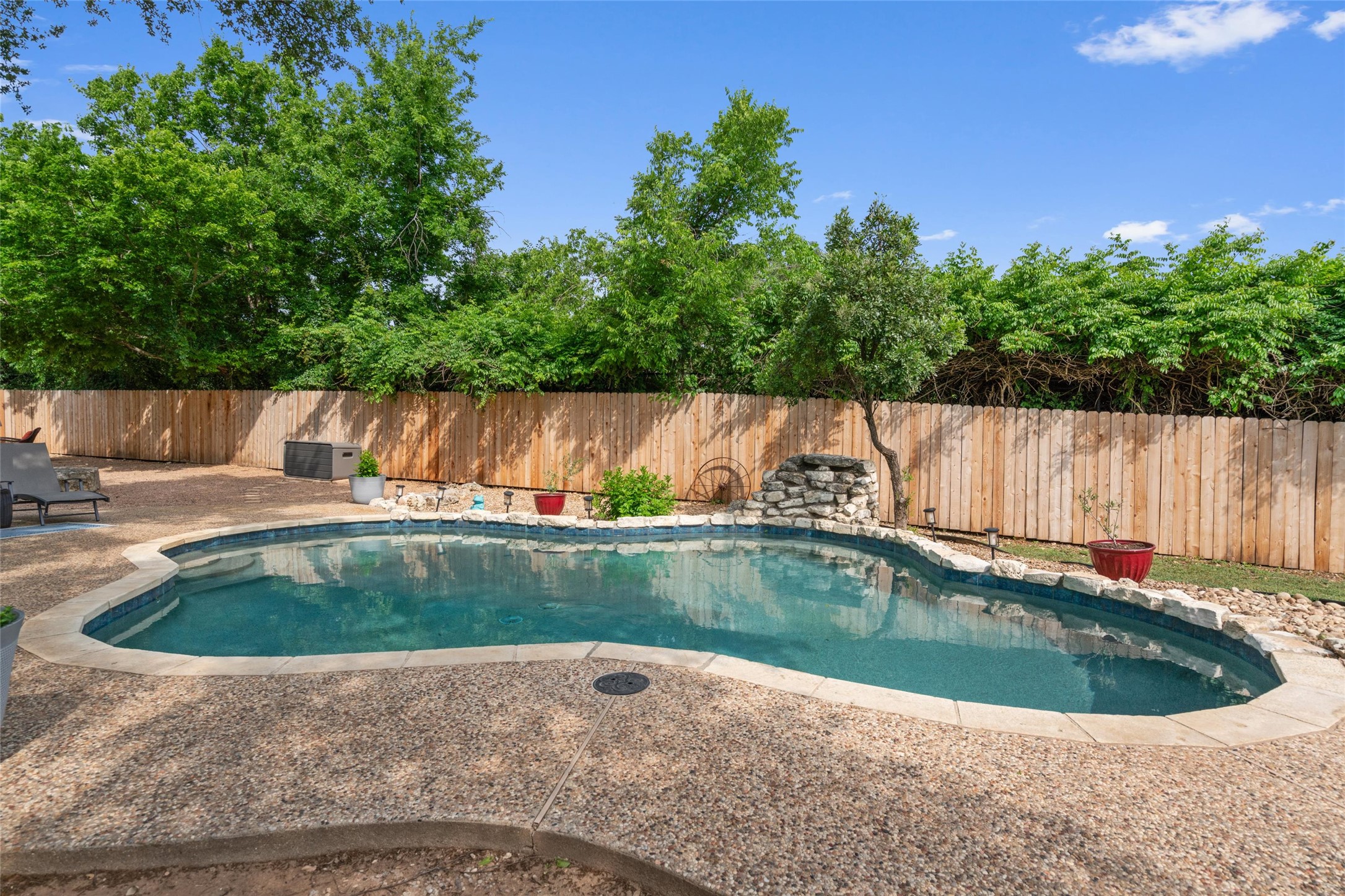 720 Circle G Ranch Road Austin, TX 78737 - Photo 28 of 37 a view of swimming pool with outdoor seating