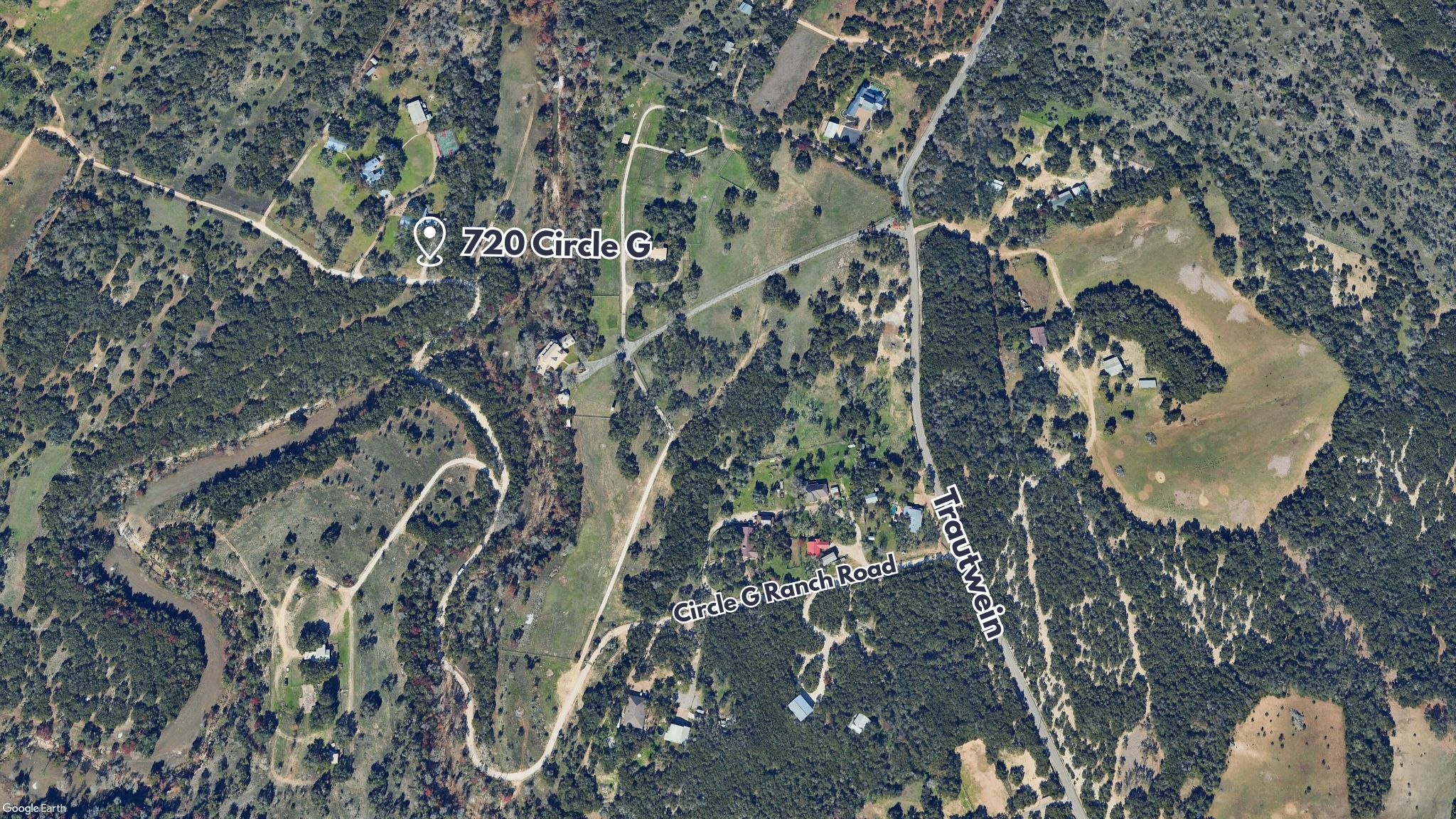 720 Circle G Ranch Road Austin, TX 78737 - Photo 35 of 37 a view of a tree in a backyard